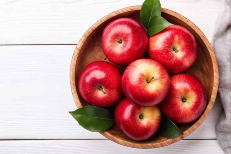 Red apples on a plate 
