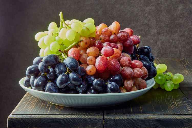 Different varieties grapes on a plate 